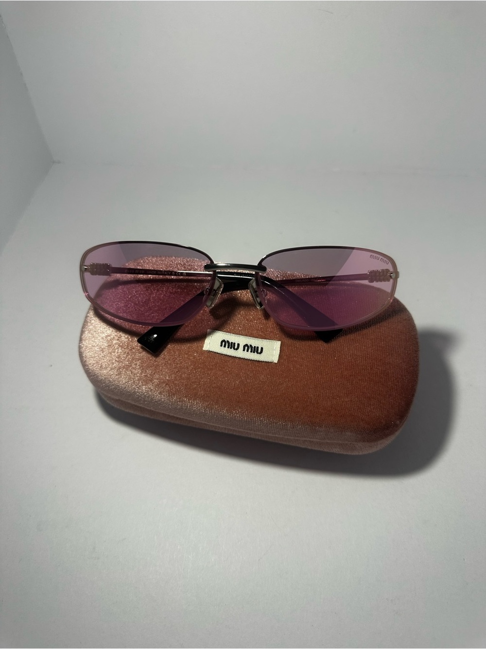Miu Miu Pink Rimless Women's Sunglasses